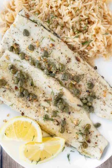 Plate of Rainbow trout with a side of rice.