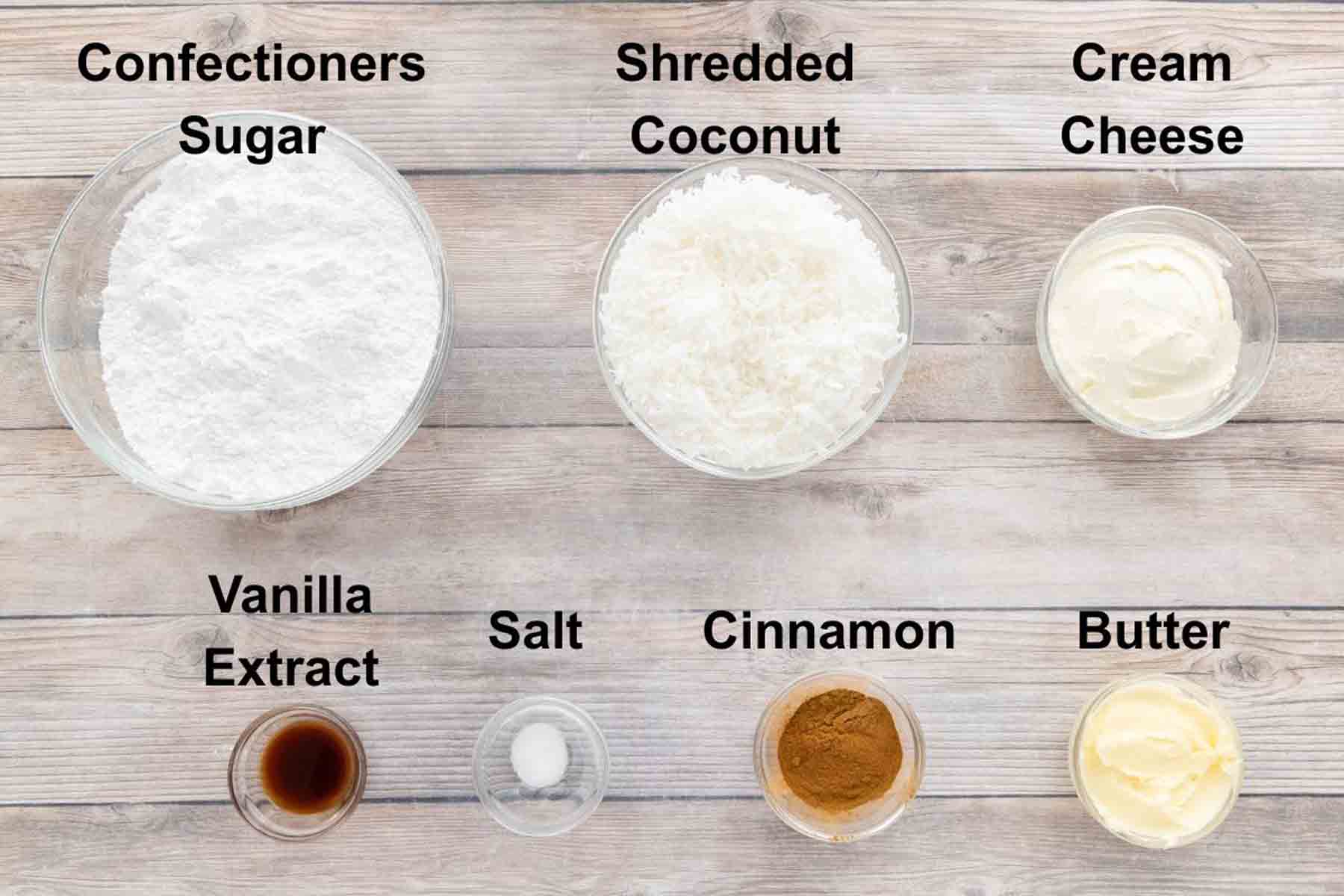 Ingredients to make Irish Potato Candies.  Confectioner's sugar, shredded coconut, cream cheese, vanilla extract, salt, cinnamon, and butter. 